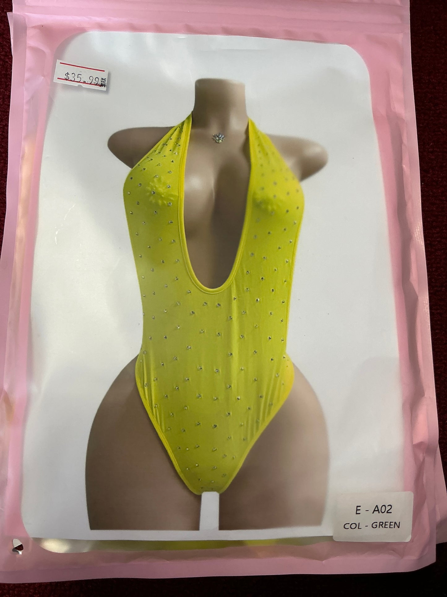 Diamond plunge neck thong suit