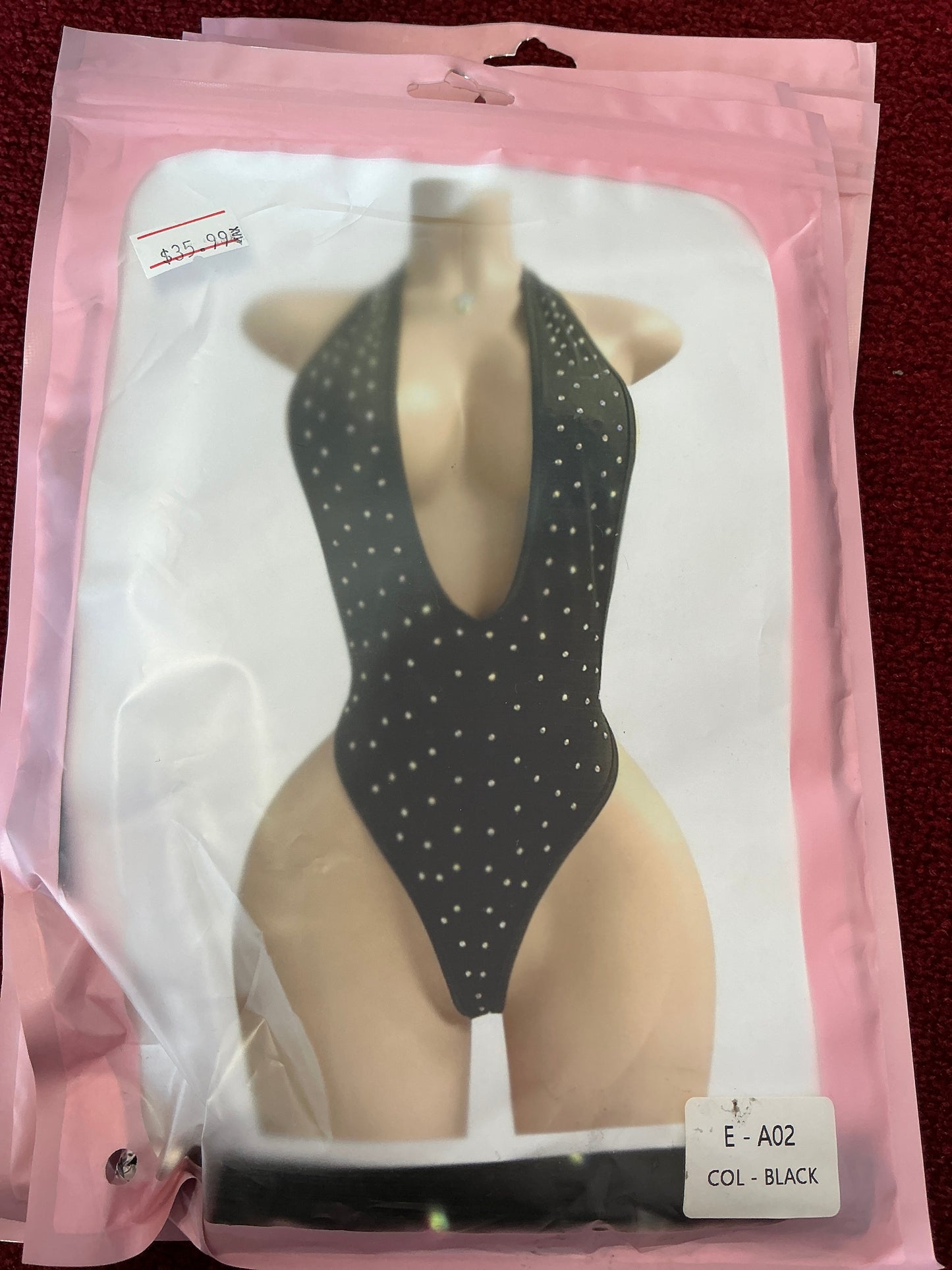 Diamond plunge neck thong suit