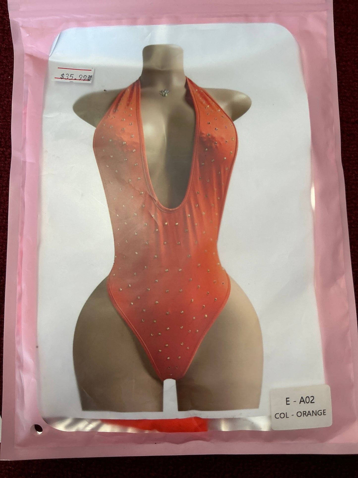 Diamond plunge neck thong suit