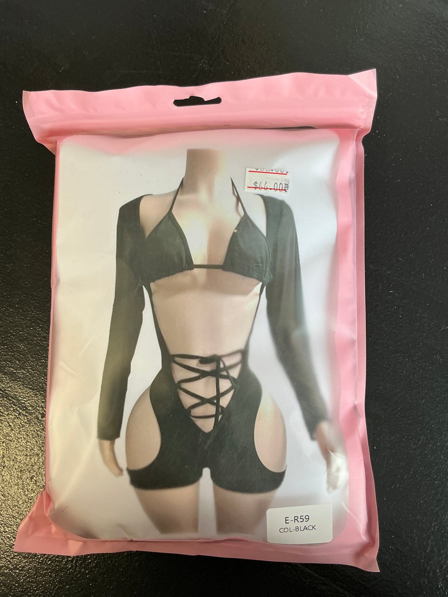 Long sleeve, open front romper with tight up front bikini and top