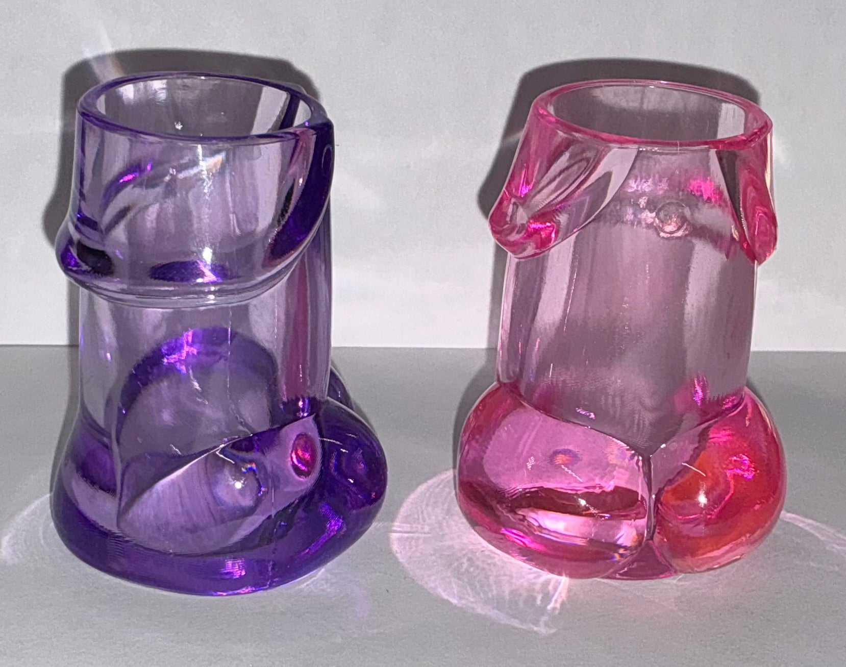 Blue and pink penis. Shot cups.